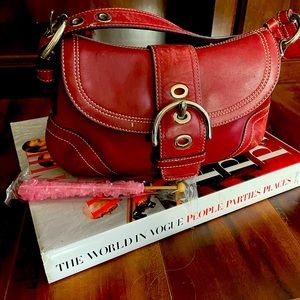 Authentic Coach Soho Buckle handbag in Cranberry